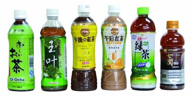 Dwustronny automatyczny aplikator etykiet termokurczliwych na wodę mineralną