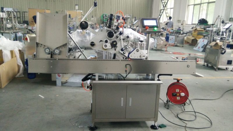 Chiny Szybka maszyna do etykietowania małych okrągłych puszek, maszyna do naklejania etykiet z czarną butelką dla dostawcy kosmetyków